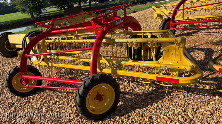 image for item DY0600 New Holland Rolabar 258 hay rake