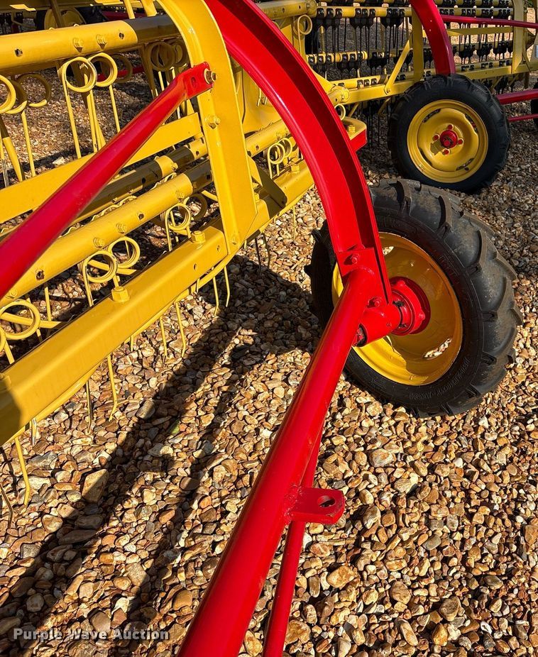 image for item DY0600 New Holland Rolabar 258 hay rake
