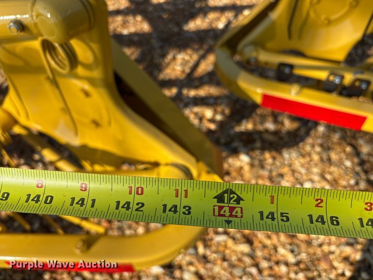 image for item DY0600 New Holland Rolabar 258 hay rake