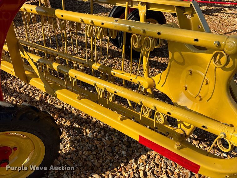 image for item DY0600 New Holland Rolabar 258 hay rake