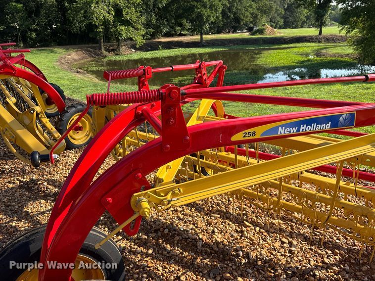 image for item DY0600 New Holland Rolabar 258 hay rake