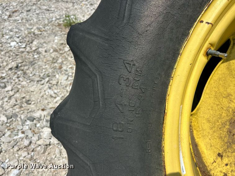 image for item EK8215 Firestone (2) 18.4-34 Firestone tractor tires and wheels