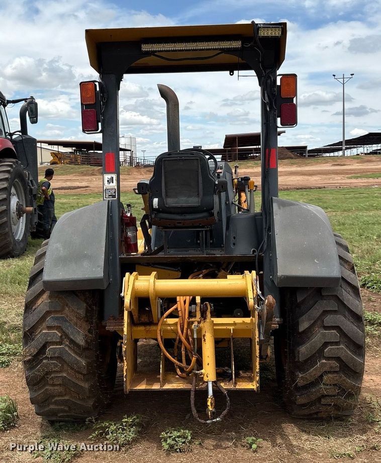 image for item EM2638 2012 John Deere 210K landscape tractor