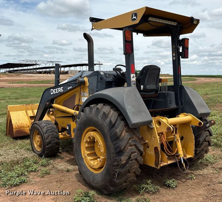 image for item EM2638 2012 John Deere 210K landscape tractor