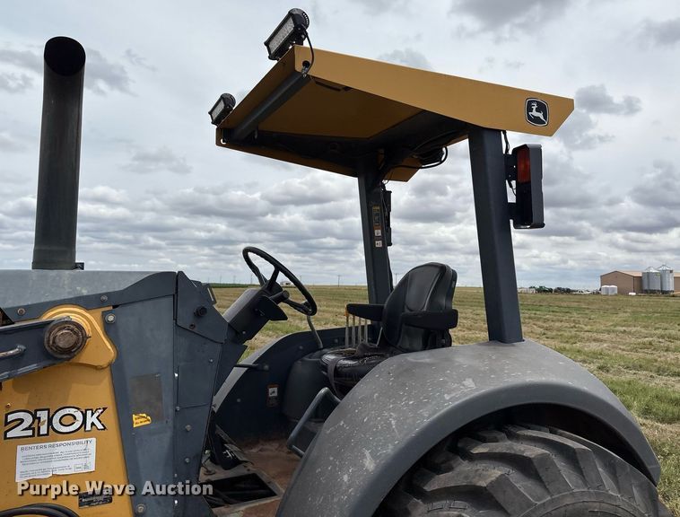 image for item EM2638 2012 John Deere 210K landscape tractor