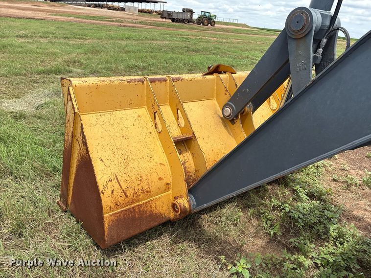 image for item EM2638 2012 John Deere 210K landscape tractor