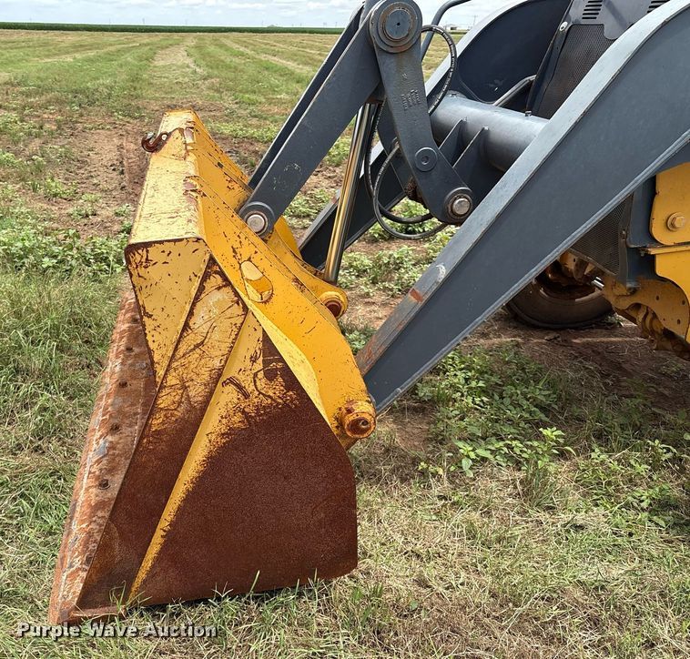 image for item EM2638 2012 John Deere 210K landscape tractor