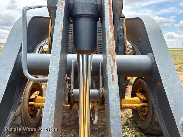 image for item EM2638 2012 John Deere 210K landscape tractor