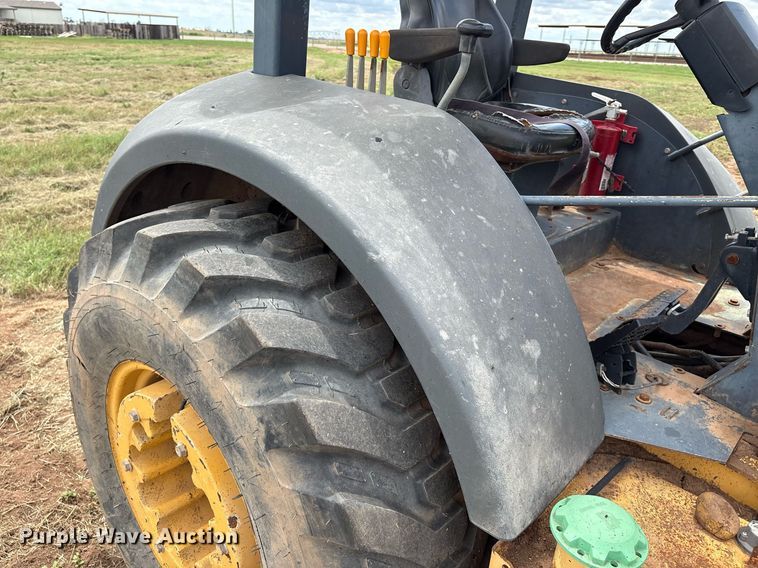 image for item EM2638 2012 John Deere 210K landscape tractor