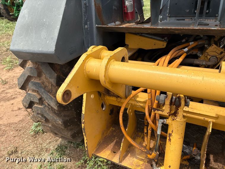 image for item EM2638 2012 John Deere 210K landscape tractor