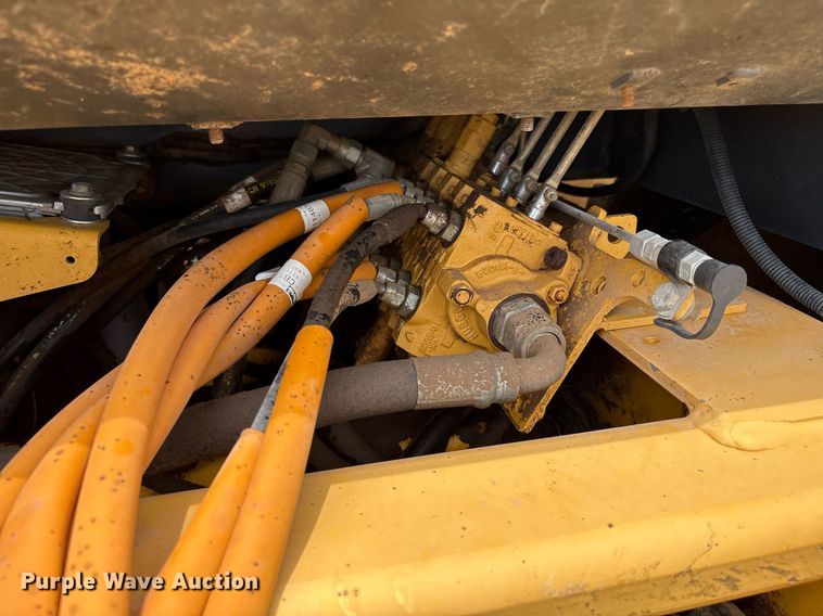 image for item EM2638 2012 John Deere 210K landscape tractor