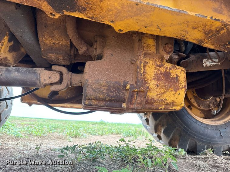 image for item EM2638 2012 John Deere 210K landscape tractor