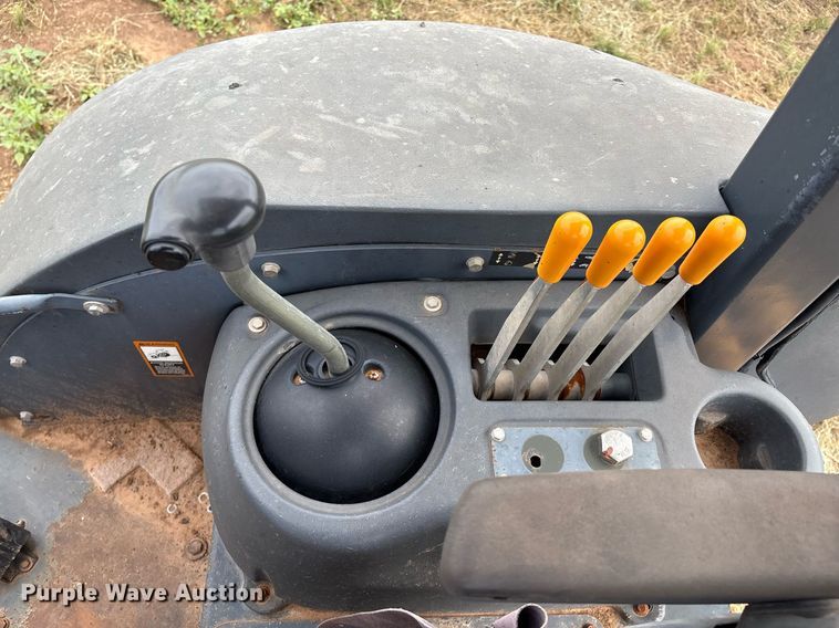 image for item EM2638 2012 John Deere 210K landscape tractor