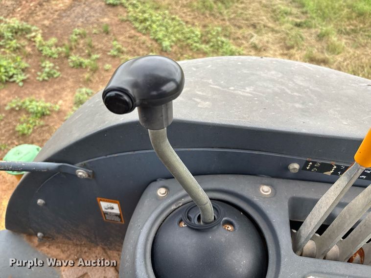 image for item EM2638 2012 John Deere 210K landscape tractor