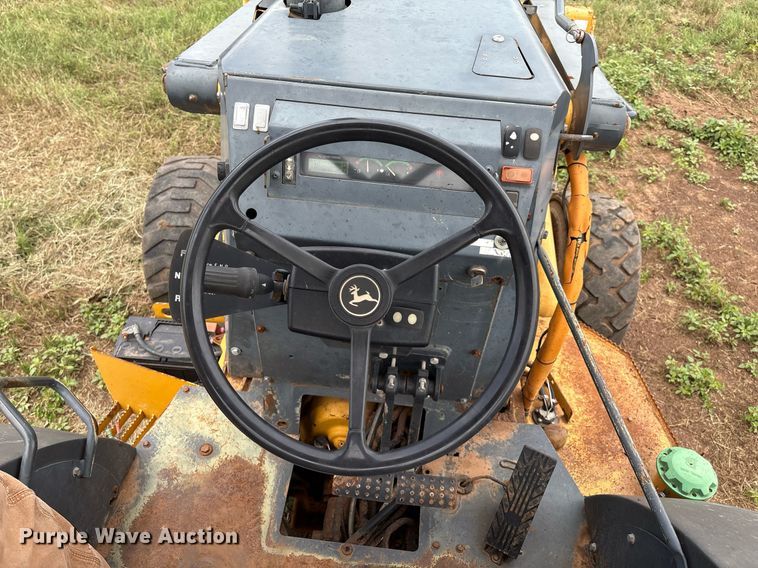 image for item EM2638 2012 John Deere 210K landscape tractor