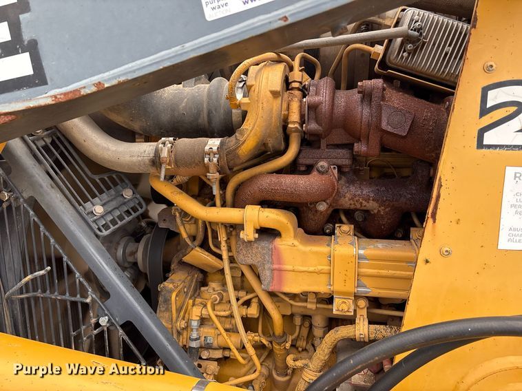 image for item EM2638 2012 John Deere 210K landscape tractor