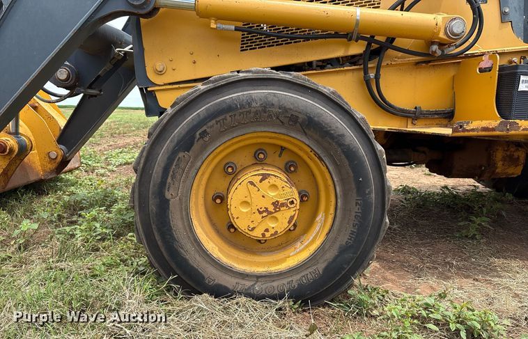 image for item EM2638 2012 John Deere 210K landscape tractor