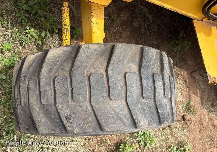 image for item EM2638 2012 John Deere 210K landscape tractor