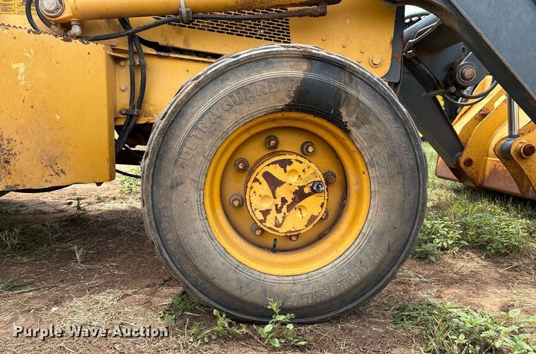 image for item EM2638 2012 John Deere 210K landscape tractor