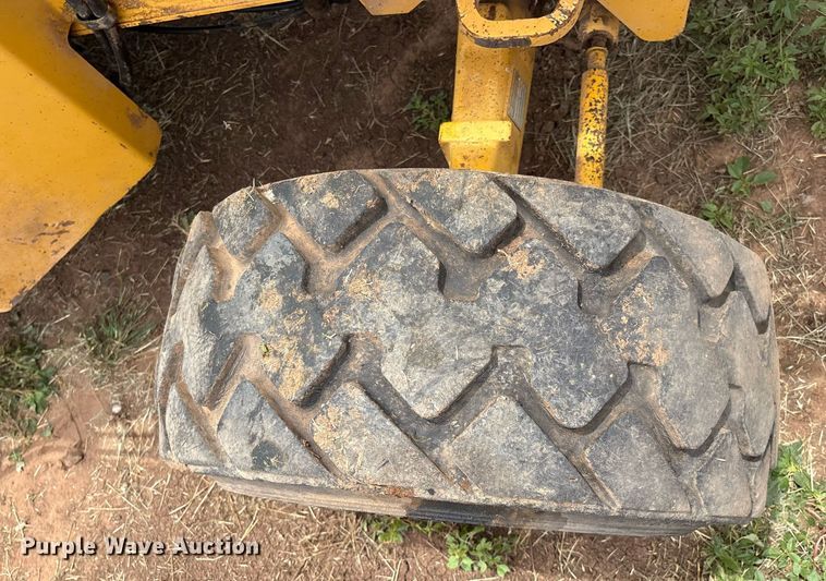 image for item EM2638 2012 John Deere 210K landscape tractor