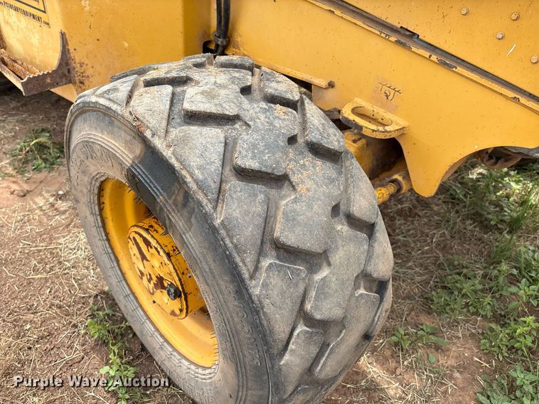 image for item EM2638 2012 John Deere 210K landscape tractor