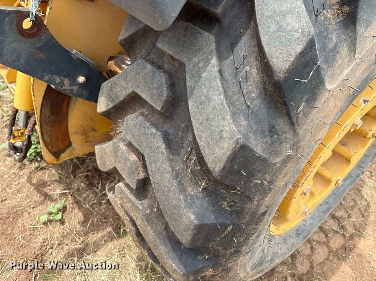 image for item EM2638 2012 John Deere 210K landscape tractor