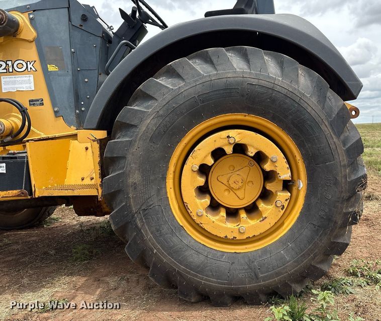 image for item EM2638 2012 John Deere 210K landscape tractor