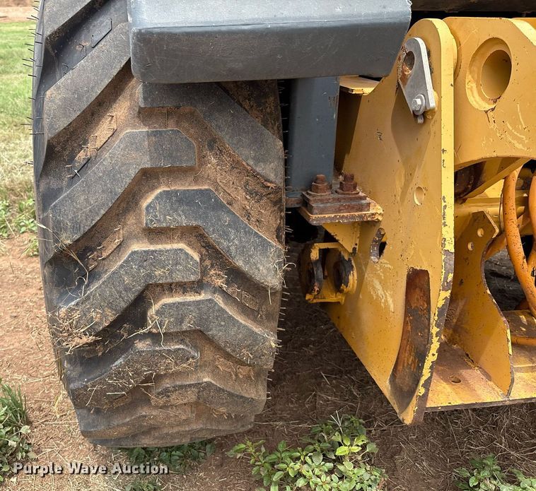 image for item EM2638 2012 John Deere 210K landscape tractor