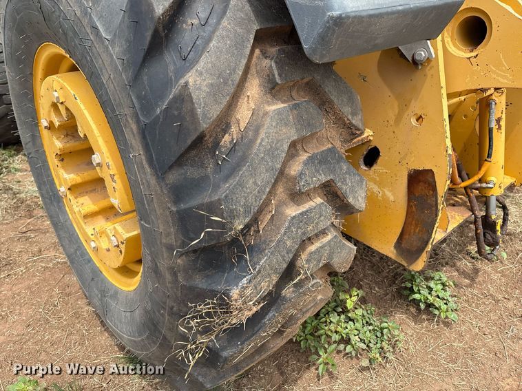 image for item EM2638 2012 John Deere 210K landscape tractor