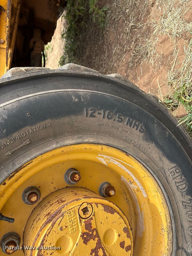 image for item EM2638 2012 John Deere 210K landscape tractor