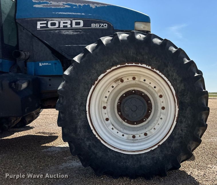 image for item EQ4889 Ford 8670 MFWD tractor