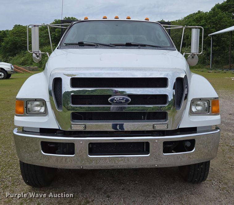 image for item DP6402 2011 Ford F750 Super Duty Ext. Cab dump flatbed truck