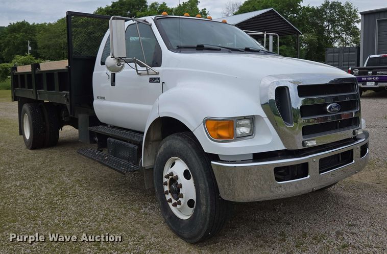 image for item DP6402 2011 Ford F750 Super Duty Ext. Cab dump flatbed truck