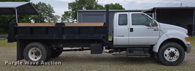 image for item DP6402 2011 Ford F750 Super Duty Ext. Cab dump flatbed truck