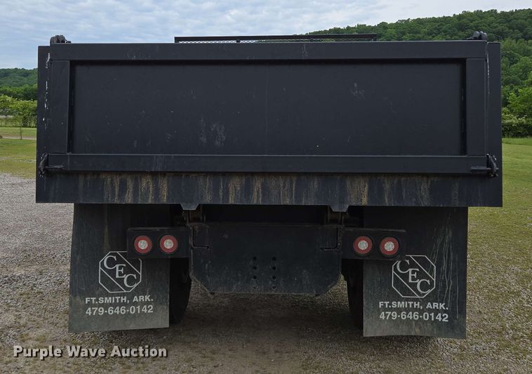 image for item DP6402 2011 Ford F750 Super Duty Ext. Cab dump flatbed truck