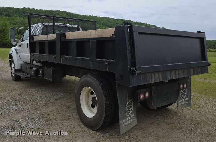 image for item DP6402 2011 Ford F750 Super Duty Ext. Cab dump flatbed truck