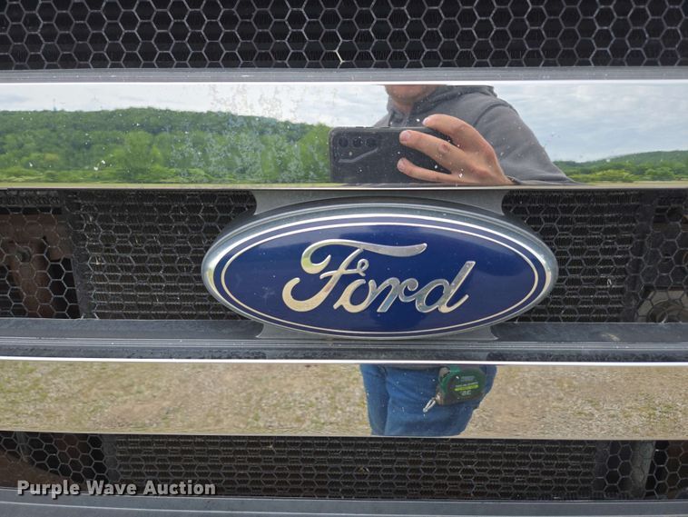 image for item DP6402 2011 Ford F750 Super Duty Ext. Cab dump flatbed truck