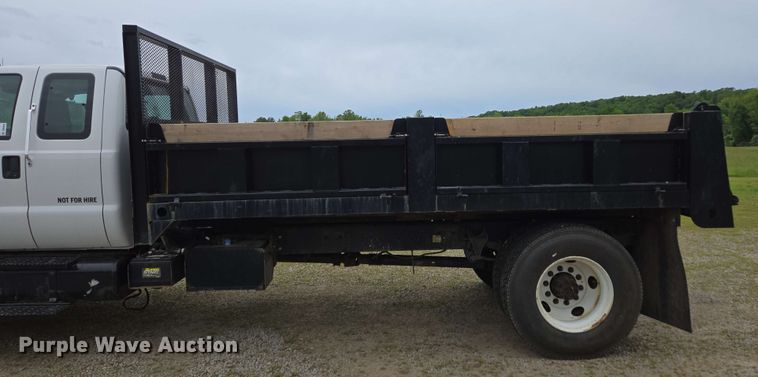 image for item DP6402 2011 Ford F750 Super Duty Ext. Cab dump flatbed truck