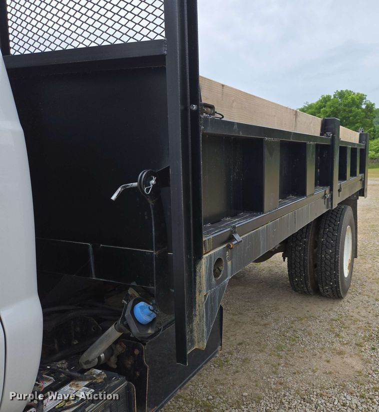 image for item DP6402 2011 Ford F750 Super Duty Ext. Cab dump flatbed truck