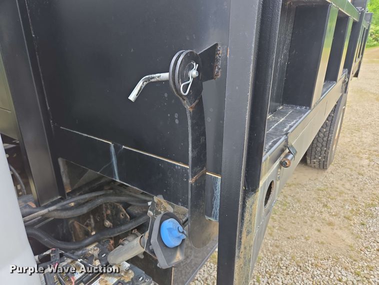 image for item DP6402 2011 Ford F750 Super Duty Ext. Cab dump flatbed truck