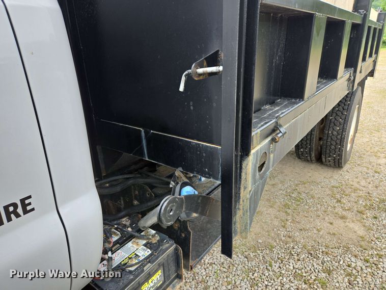 image for item DP6402 2011 Ford F750 Super Duty Ext. Cab dump flatbed truck