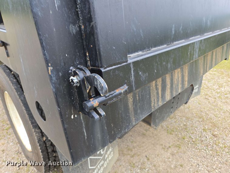 image for item DP6402 2011 Ford F750 Super Duty Ext. Cab dump flatbed truck