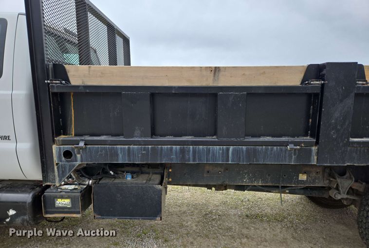 image for item DP6402 2011 Ford F750 Super Duty Ext. Cab dump flatbed truck