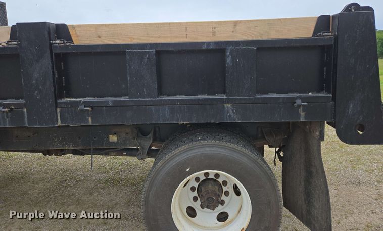 image for item DP6402 2011 Ford F750 Super Duty Ext. Cab dump flatbed truck