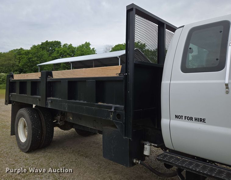 image for item DP6402 2011 Ford F750 Super Duty Ext. Cab dump flatbed truck