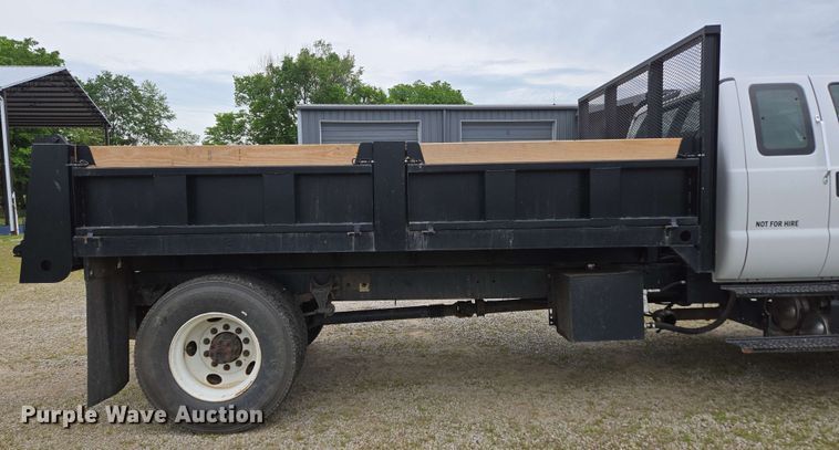 image for item DP6402 2011 Ford F750 Super Duty Ext. Cab dump flatbed truck
