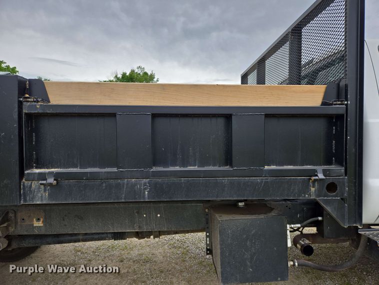 image for item DP6402 2011 Ford F750 Super Duty Ext. Cab dump flatbed truck