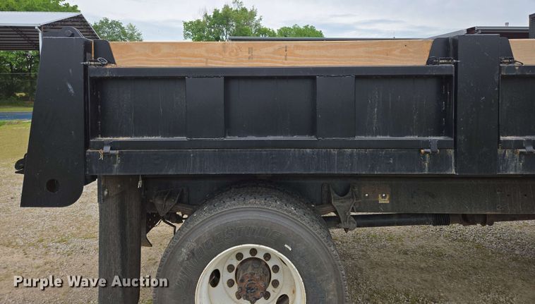 image for item DP6402 2011 Ford F750 Super Duty Ext. Cab dump flatbed truck