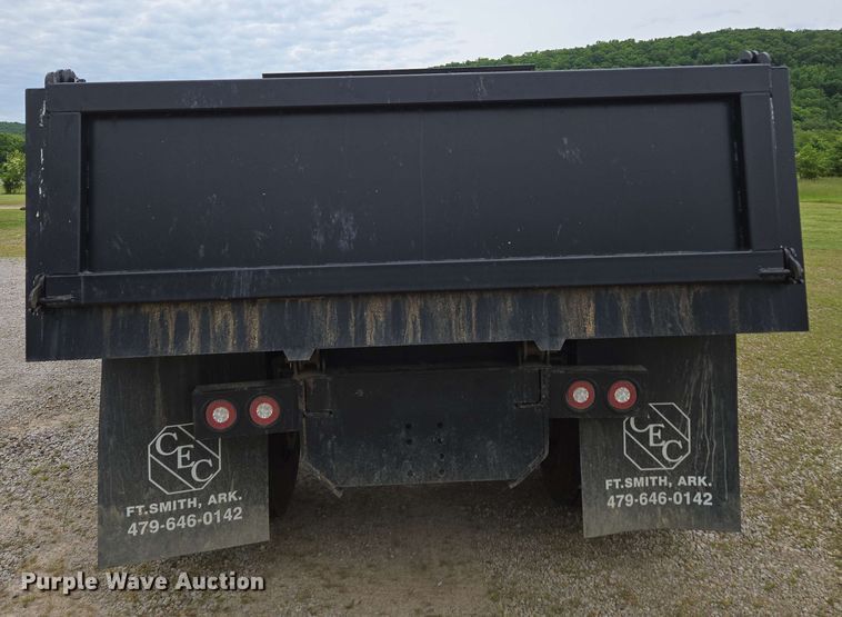 image for item DP6402 2011 Ford F750 Super Duty Ext. Cab dump flatbed truck