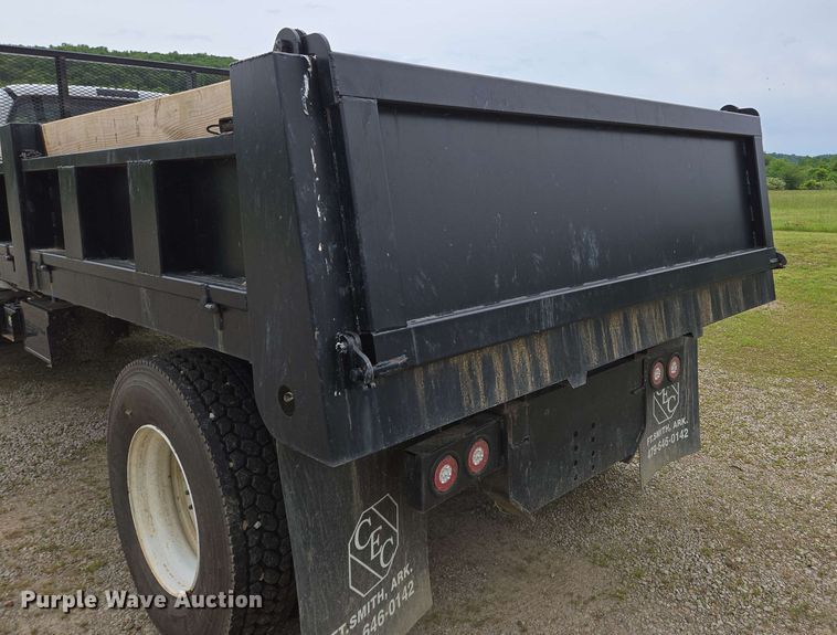 image for item DP6402 2011 Ford F750 Super Duty Ext. Cab dump flatbed truck